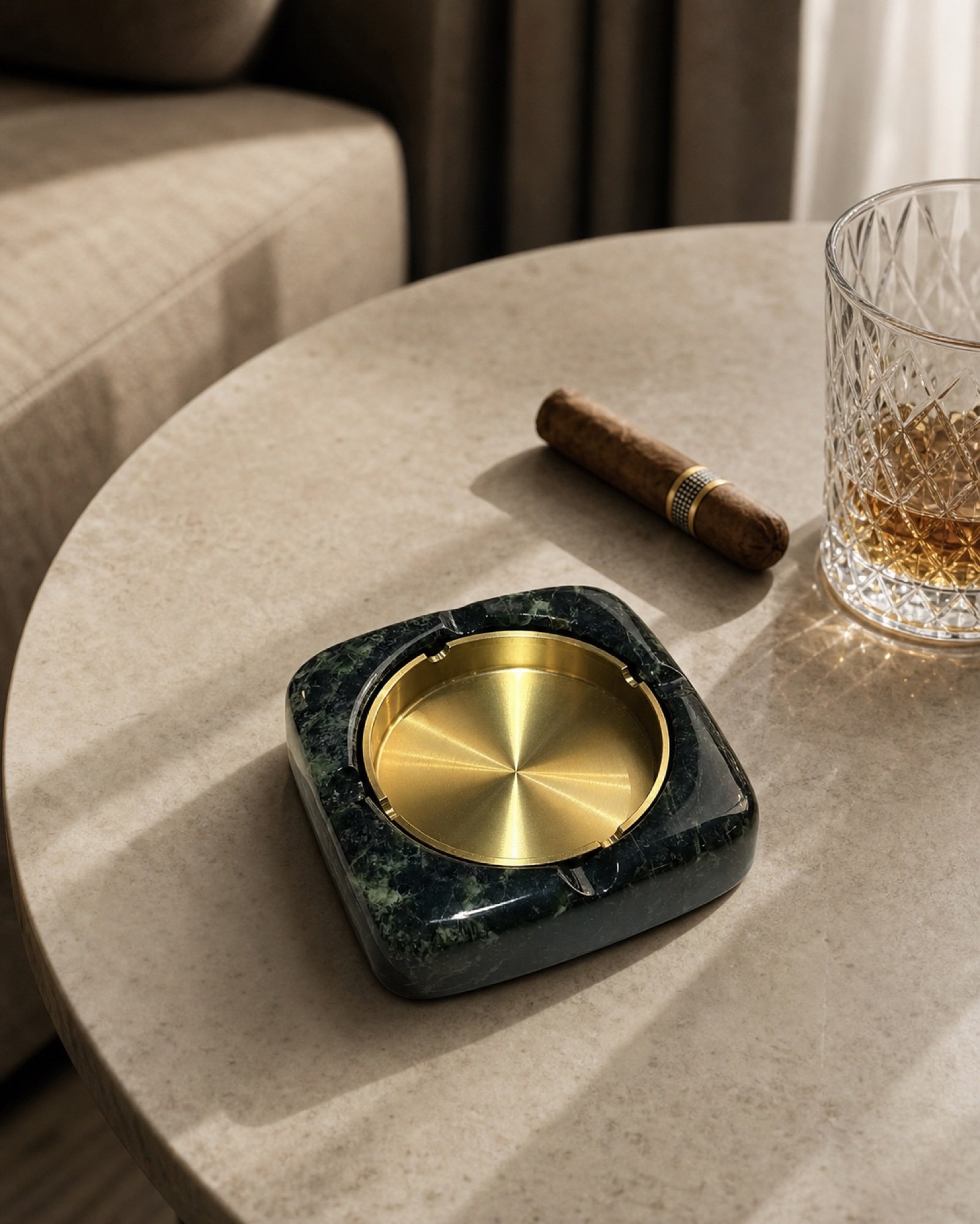 Black Gold Ashtray in a styled natural stone interior