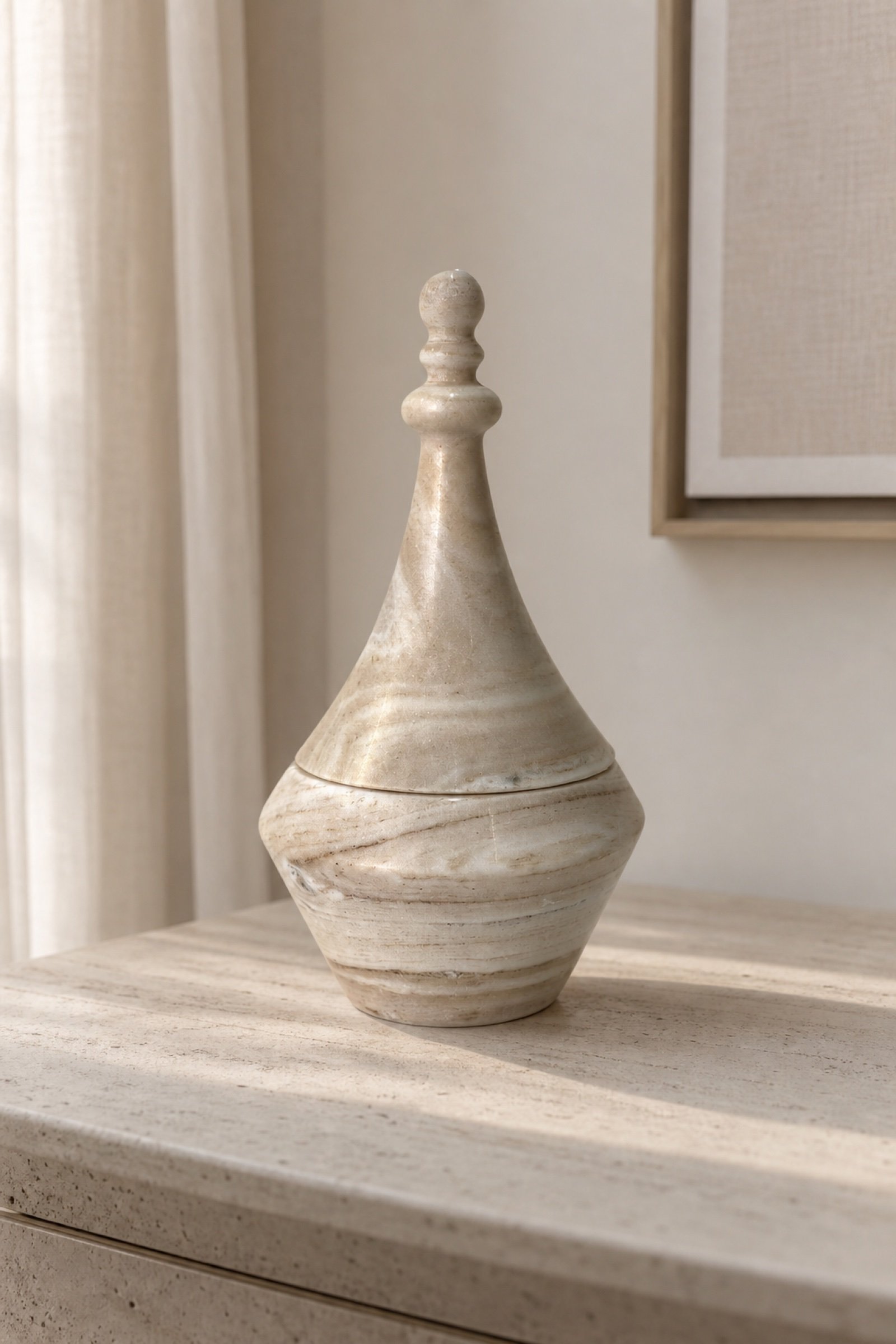 Cream Lidded Vase in a styled natural stone interior