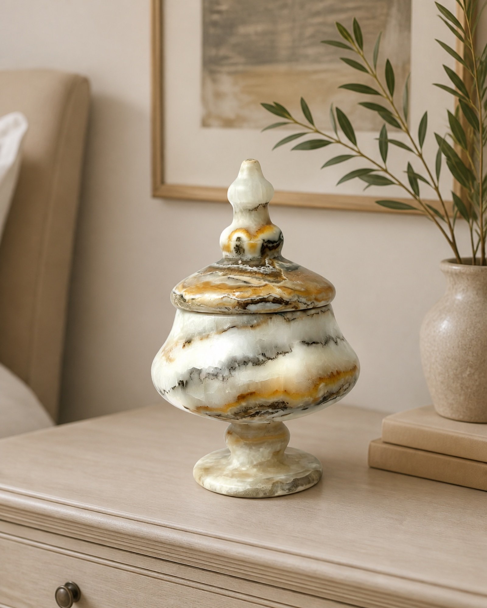 Lidded Pedestal Jar in a styled natural stone interior