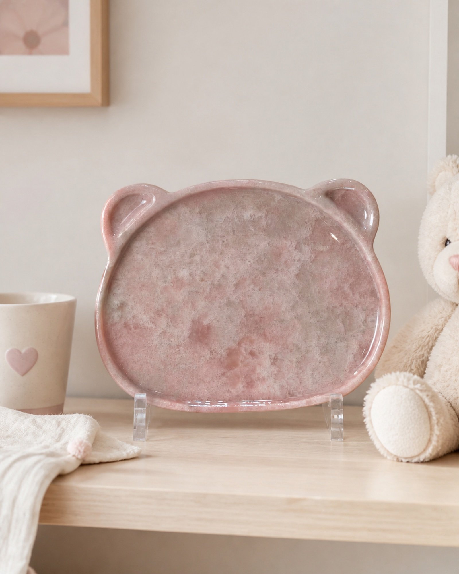 Pink Bear Face Plaque in a styled natural stone interior