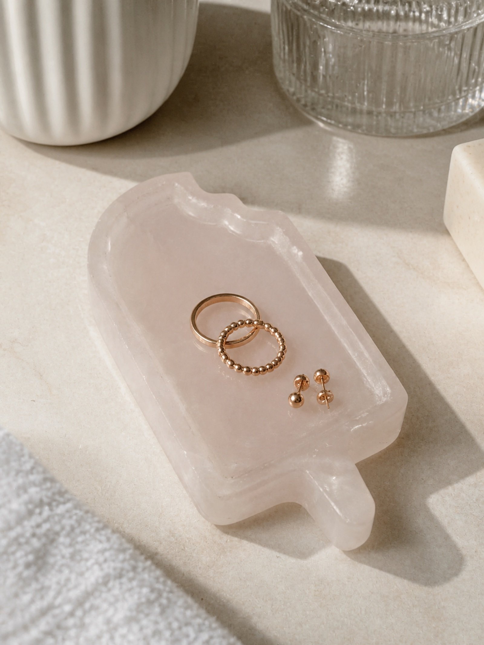 Pink Paddle Tray in a styled natural stone interior