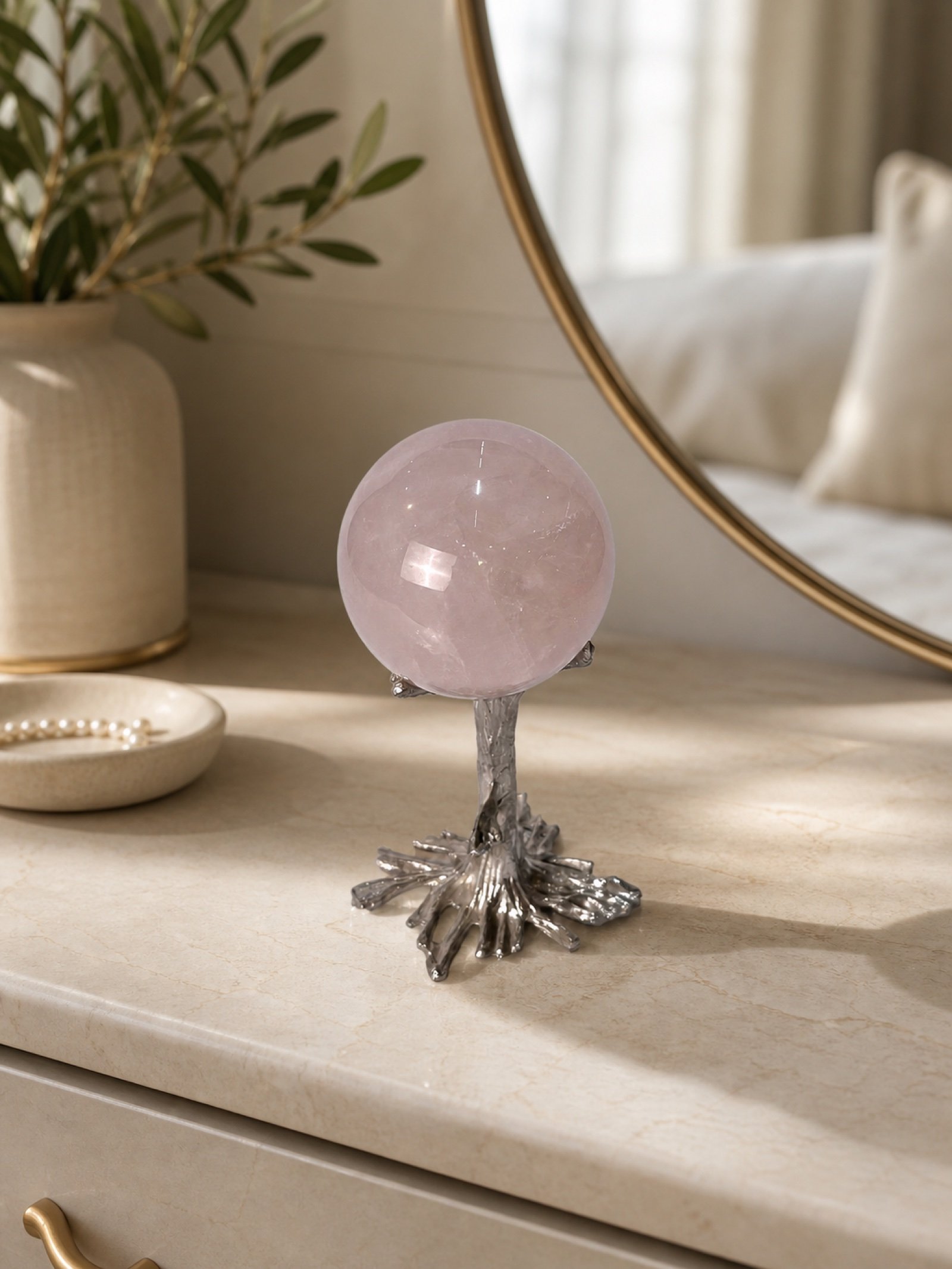 Pink Sphere Stand in a styled natural stone interior