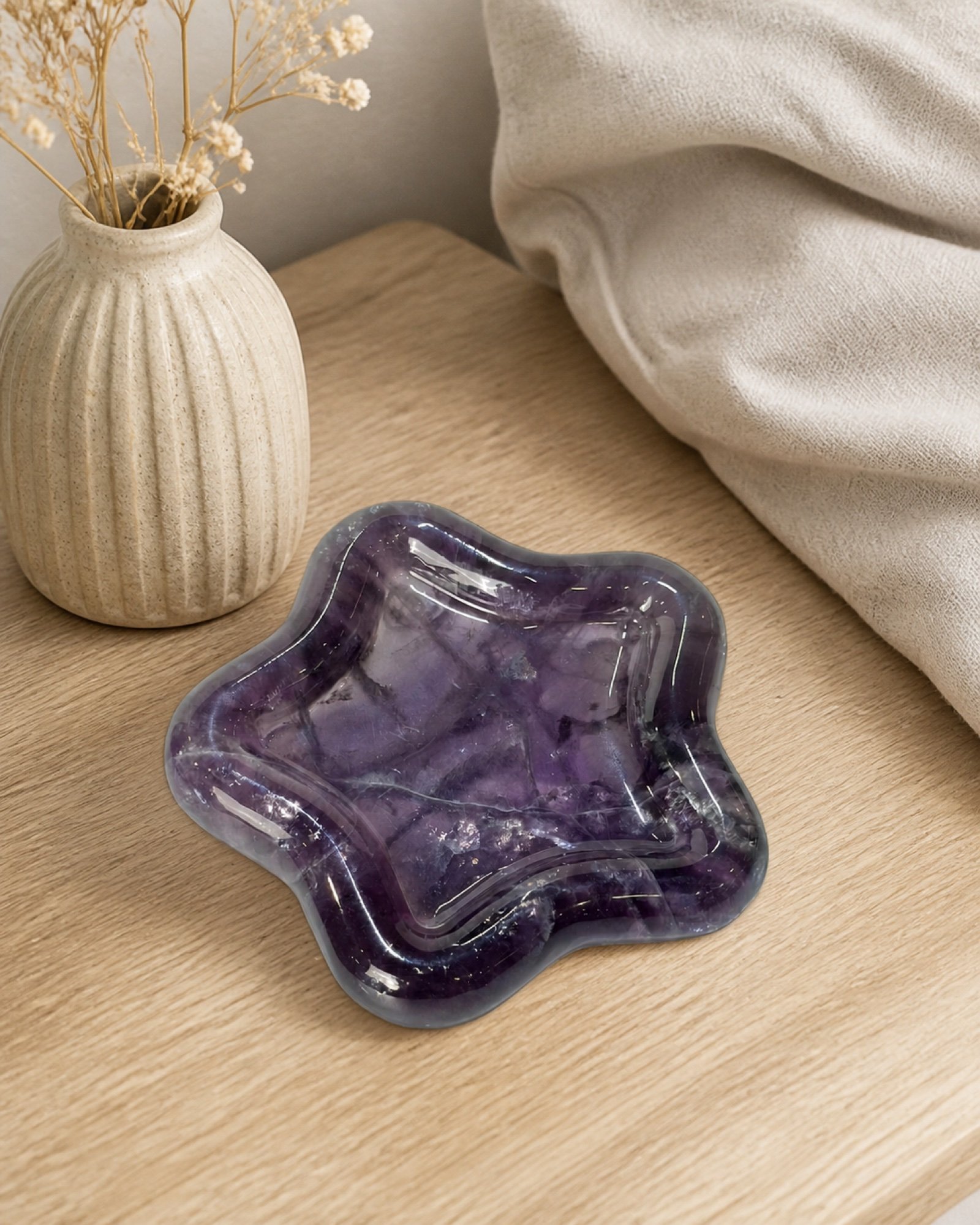 Purple Star Bowl in a styled natural stone interior